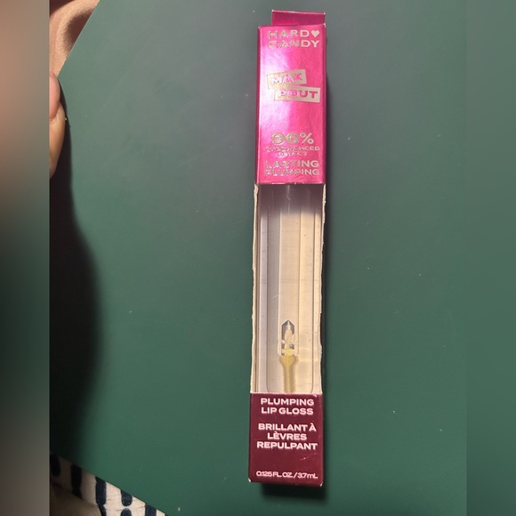 Hard candy, sealed plumping lipgloss, in a clear shade - Picture 1 of 4